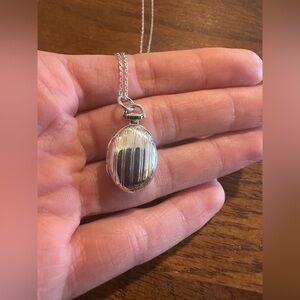 Monica Rich Kosann pinstriped oval locket on 18” sterling silver chain